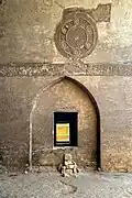 Iwan, epigraphic medallion and view to the north chamber