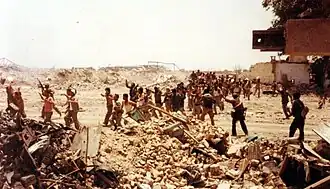 Captive soldiers in single file.