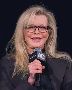 Basinger smiling