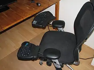 Chair integrated keyboard