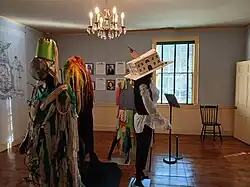 Clothing displayed in one of King Manor's second floor bedrooms as part of the Jamaica/Jamaica exhibit in 2025