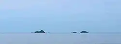 Ko Sai island (left) seen from the shore. Ko Khi Nok (center) and Ko Sadao island (right) are smaller.