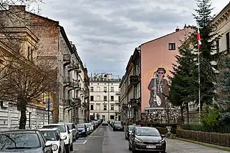 Eastern part of the street. In the tenement house at 8 Koletek Street mural dedicated to Andrzej Bieniasz, musician of the Püdels.