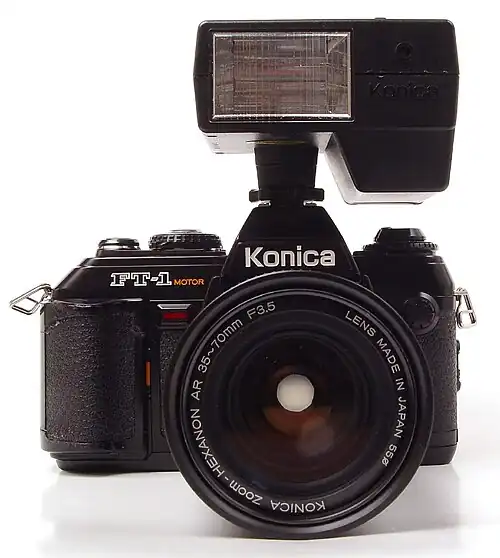 Zoom Hexanon 3.5/35–70&nbsp;mm (and flash X-24)
