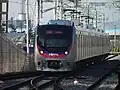 A train entering the station premises from a circuit line