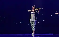 Ksenija Milosevic plays on violin during Eurovision Song Contest 2012