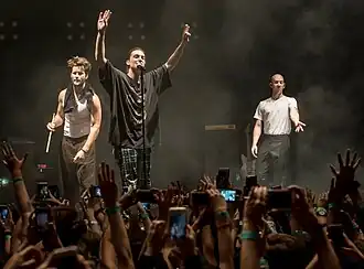 LANY performing in 2017. Left to right: Jake Goss, Paul Klein, Les Priest