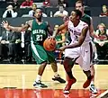 Cal Poly's Shawn Lewis (23) defends against San Diego State during a 51–45 loss to the 10th-ranked Aztecs in December 2010.