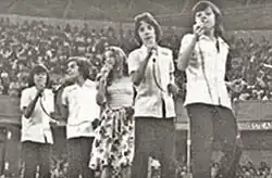 A scanned photo from old family pictures of the Spanish group singing in San Juan, Puerto Rico, 1975