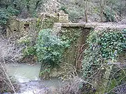 The dam of the ruined mill of Rossignol, in Rognes