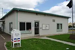 Photograph of the city hall building exterior.
