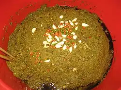 Lahpet dressed with garlic and chilli