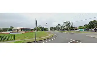 Panorama of Lalor Park's central hub, with the community precinct on the left side of Freeman street, and the shopping district with its carpark on the right side