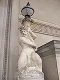 Lampholder, eastern elevation, in the form of a Triton holding a Cornucopia, sculpted by W.G. Nicholl