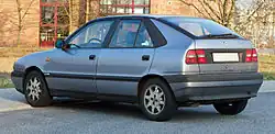 Rear three-quarter view of an early five-door model