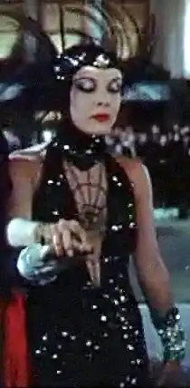 Singin' in the Rain (1952), a satiric "spider web" dress for Judy Landon as fictitious vamp Olga Mara