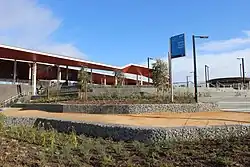 The landscaped forecourt of Middle Gorge Station.