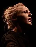 Colour photograph of Laura Marling performing live in 2009
