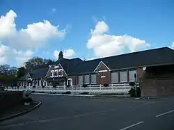 The town hall and school in Le Plessier-Rozainvillers