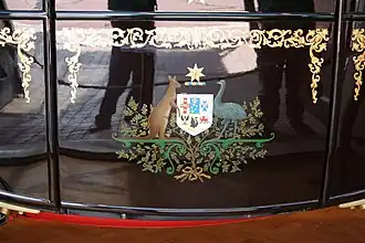 Australia coat of arms emblem on coach door