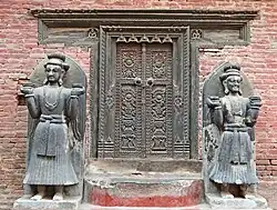 Sculpture of Jagata Prakasha Malla and his minister Chandrasekhara at the royal palace of Bhaktapur.