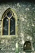 The south side of the chancel, showing a blocked aperture through which an anchorite would once have received the Blessed Sacrament
