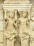 Caryatids on the facade of palazzo Marrese