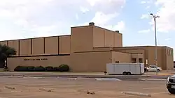 Legacy High School, a large tan brick building
