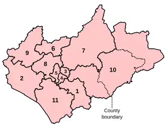 A map of a large county and an adjacent small county, to the east. The two counties are divided into a total of ten constituencies