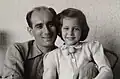 Leon Herzog and Myrna Herzog at the varanda of their home