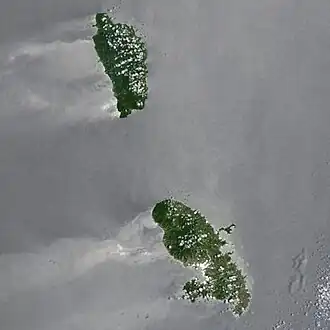 The image shows two islands, Dominica and Martinique. The strait of water between them is the Martinique Passage