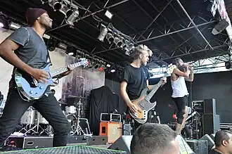 Letlive performing at 2014's Summerblast Festival in Trier, Germany. (L–R: Jean Nascimento, Ryan Johnson, Jason Butler. Obscured: Loniel Robinson, Jeff Sahyoun)