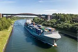 A container ship with both bridges