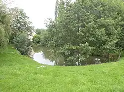 The park lake in Lhéraule