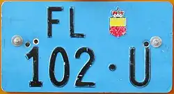 Liechtenstein dealer license plate, with light blue background for utility and industrial vehicles.