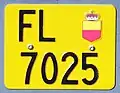 Liechtenstein motorcycle license plate with a yellow background are used for small motorcycles, light vehicles, light motor vehicles and electric vehicles. These plates are numbered between 7000 and 7999.