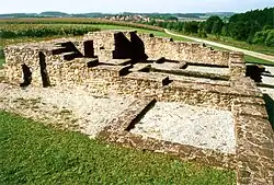 View from the northeast; in the foreground are the foundations of an older Roman stone tower (1995)