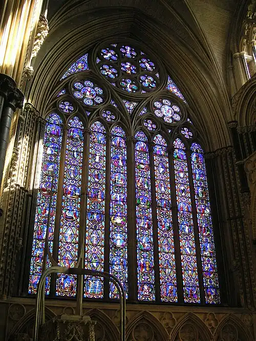 One of England's largest windows, the east window of Lincoln Cathedral, Ward and Nixon (1855), is a formal arrangement of small narrative scenes in roundels