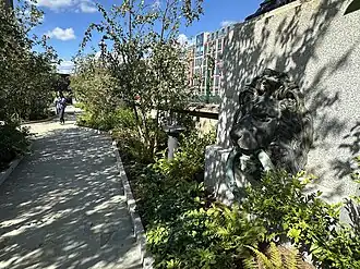 Lion mooring ring and foliage
