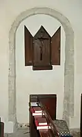 St Margaret's parish church: blocked Norman north doorway in north aisle