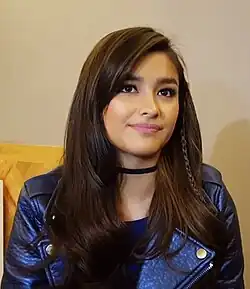 An image of Soberano speaking to a reporter off-screen during a interview