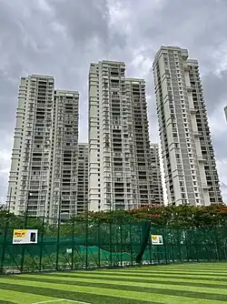 A residential skyscraper complex with three towers.