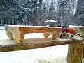 Bedside table made from a log cut in half