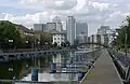 Looking towards Pan Peninsula and Canary Wharf from the south end of Millwall Dock.