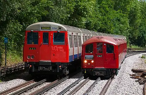 Image 49London Underground A60 Stock (left) and 1938 Stock (right) trains showing the difference in the sizes of the two types of rolling stock operated on the system. A60 stock trains operated on the surface and sub-surface sections of the Metropolitan line from 1961 to 2012 and 1938 Stock operated on various deep level tube lines from 1938 to 1988.