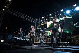 The members of Lonestar performing a concert at the Boots on the Water Cruise.