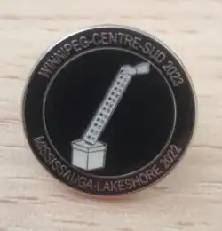 Commemorative pin given to candidates in the 2022 Mississauga—Lakeshore and 2023 Winnipeg South Centre by-elections