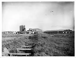 Large, low buildings, seen from a distance