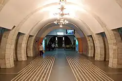 View from the central hall towards the station's escalator tunnel.