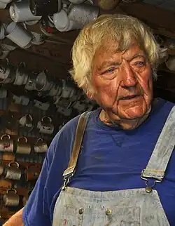 M.T. Liggett as he appears in his workshop in Mullinville (2013)